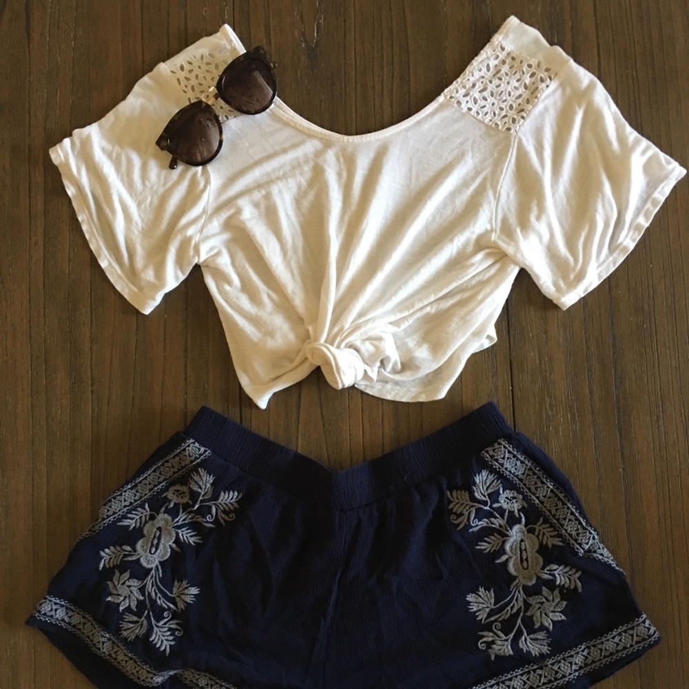 Navy and white embroidered shorts from Francesca’s